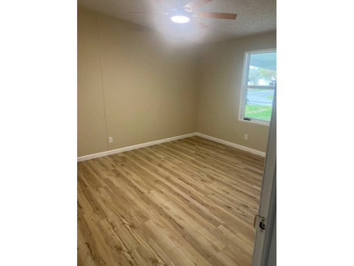 Don't miss your chance to own this beautifully renovated home in on Hamptons Golf Club in Florida - for sale on GolfHomes.com, golf home, golf lot