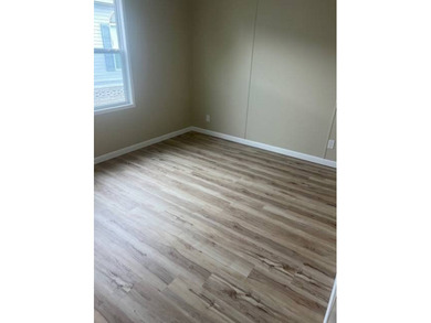 Don't miss your chance to own this beautifully renovated home in on Hamptons Golf Club in Florida - for sale on GolfHomes.com, golf home, golf lot