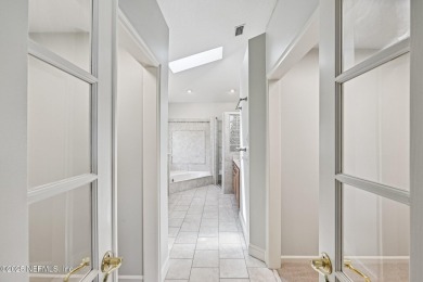 Welcome to this beautifully updated 4-bedroom, 3-bathroom pool on Jacksonville Golf and Country Club in Florida - for sale on GolfHomes.com, golf home, golf lot