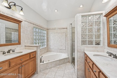 Welcome to this beautifully updated 4-bedroom, 3-bathroom pool on Jacksonville Golf and Country Club in Florida - for sale on GolfHomes.com, golf home, golf lot