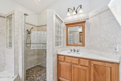 Welcome to this beautifully updated 4-bedroom, 3-bathroom pool on Jacksonville Golf and Country Club in Florida - for sale on GolfHomes.com, golf home, golf lot