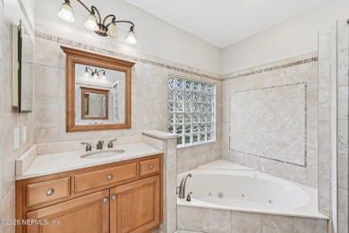 Welcome to this beautifully updated 4-bedroom, 3-bathroom pool on Jacksonville Golf and Country Club in Florida - for sale on GolfHomes.com, golf home, golf lot