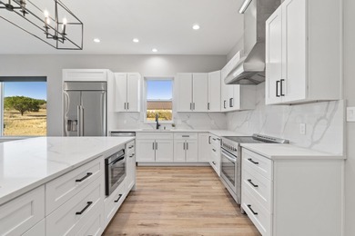 Experience the best of modern living in this stunning home on Ram Rock Golf Course in Texas - for sale on GolfHomes.com, golf home, golf lot