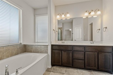 Welcome to your new home in Oak Creek Trails! Inside, you'll on The Golf Club At Champions Circle in Texas - for sale on GolfHomes.com, golf home, golf lot