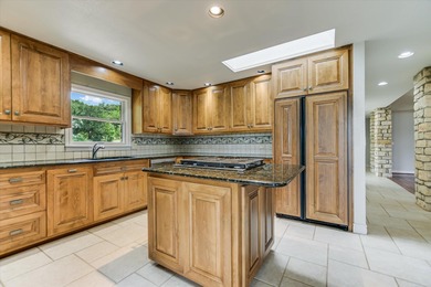 Discover your dream home nestled on the Slick Rock #12 fairway on Slick Rock Golf Course - Horseshoe Bay in Texas - for sale on GolfHomes.com, golf home, golf lot