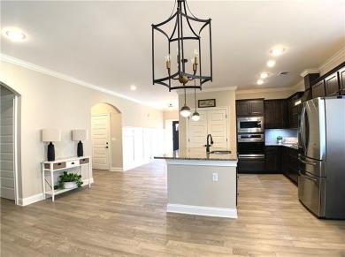 Experience comfort and peace in this beautiful home with scenic on The Auburn University Club in Alabama - for sale on GolfHomes.com, golf home, golf lot
