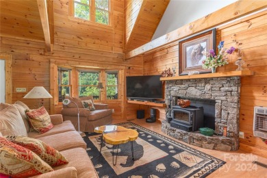 NO DAMAGE FROM HELENE-HIGH  DRY. This warm and inviting log home on Waynesville Country Club Inn in North Carolina - for sale on GolfHomes.com, golf home, golf lot