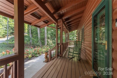 NO DAMAGE FROM HELENE-HIGH  DRY. This warm and inviting log home on Waynesville Country Club Inn in North Carolina - for sale on GolfHomes.com, golf home, golf lot