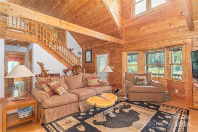 NO DAMAGE FROM HELENE-HIGH  DRY. This warm and inviting log home on Waynesville Country Club Inn in North Carolina - for sale on GolfHomes.com, golf home, golf lot