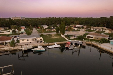 This is the one you've been waiting for -- 66 feet of waterfront on Gulf Harbors Golf Course in Florida - for sale on GolfHomes.com, golf home, golf lot