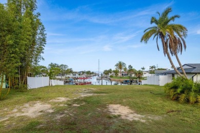 This is the one you've been waiting for -- 66 feet of waterfront on Gulf Harbors Golf Course in Florida - for sale on GolfHomes.com, golf home, golf lot