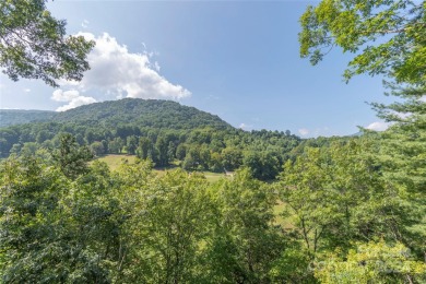 NO DAMAGE FROM HELENE-HIGH  DRY. This warm and inviting log home on Waynesville Country Club Inn in North Carolina - for sale on GolfHomes.com, golf home, golf lot