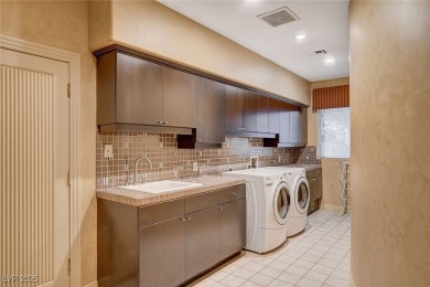 Welcome to your private oasis in the heart of the esteemed on Spanish Trail Golf and Country Club in Nevada - for sale on GolfHomes.com, golf home, golf lot