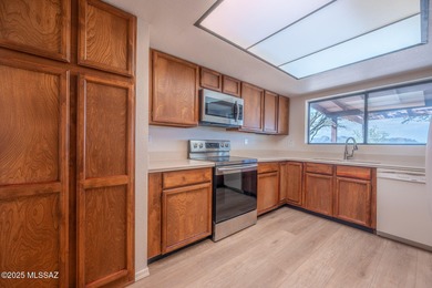 This charming home in Rio Rico, Arizona offers breathtaking on Rio Rico Resort and Country Club in Arizona - for sale on GolfHomes.com, golf home, golf lot