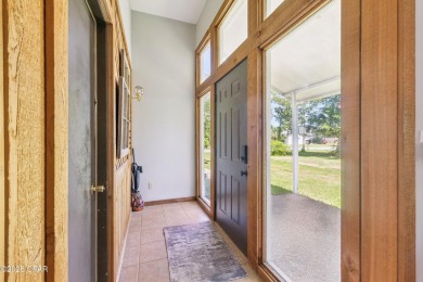 Well-maintained 3-bedroom, 2-bath home located in central Lynn on Panama Country Club in Florida - for sale on GolfHomes.com, golf home, golf lot