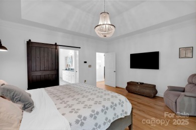 Tucked away on a peaceful cul-de-sac in one of Charlotte's most on Ballantyne Resort and Country Club in North Carolina - for sale on GolfHomes.com, golf home, golf lot