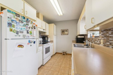 Well-maintained 3-bedroom, 2-bath home located in central Lynn on Panama Country Club in Florida - for sale on GolfHomes.com, golf home, golf lot