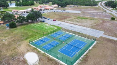 Located in a beautiful gated community, this property offers on Indian Lake Estates Golf and Country Club in Florida - for sale on GolfHomes.com, golf home, golf lot