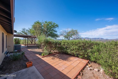 This charming home in Rio Rico, Arizona offers breathtaking on Rio Rico Resort and Country Club in Arizona - for sale on GolfHomes.com, golf home, golf lot