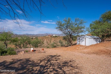 This charming home in Rio Rico, Arizona offers breathtaking on Rio Rico Resort and Country Club in Arizona - for sale on GolfHomes.com, golf home, golf lot