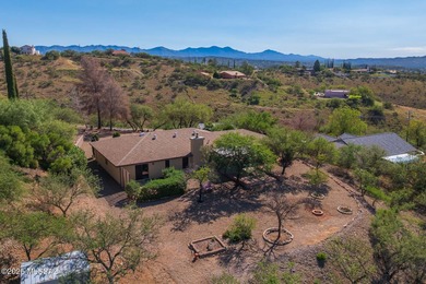 This charming home in Rio Rico, Arizona offers breathtaking on Rio Rico Resort and Country Club in Arizona - for sale on GolfHomes.com, golf home, golf lot
