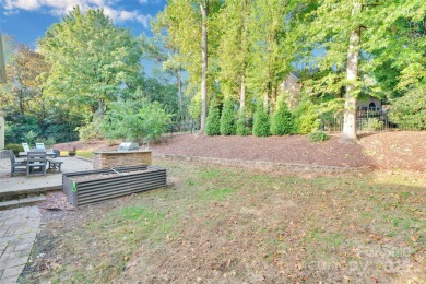 Tucked away on a peaceful cul-de-sac in one of Charlotte's most on Ballantyne Resort and Country Club in North Carolina - for sale on GolfHomes.com, golf home, golf lot