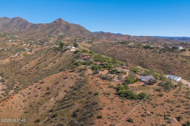 This charming home in Rio Rico, Arizona offers breathtaking on Rio Rico Resort and Country Club in Arizona - for sale on GolfHomes.com, golf home, golf lot