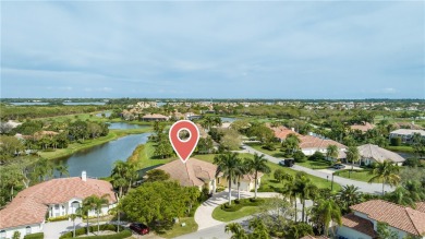 This stunning nine-year-old custom designed home is offered for on Grand Harbor Golf and Country Club in Florida - for sale on GolfHomes.com, golf home, golf lot