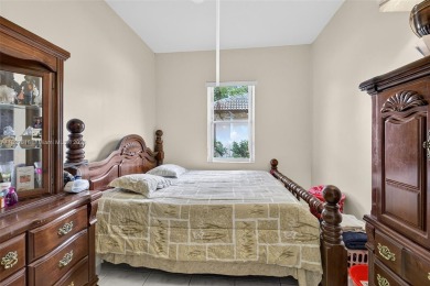 One of only three spacious single-family homes in the highly on Plantation Preserve Golf Course in Florida - for sale on GolfHomes.com, golf home, golf lot