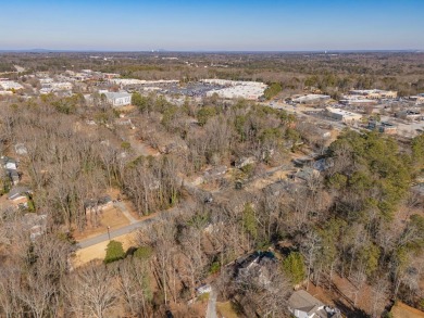 Come and see! This lovely contemporary home is an escape from on Chapel Hills Golf and Country Club in Georgia - for sale on GolfHomes.com, golf home, golf lot
