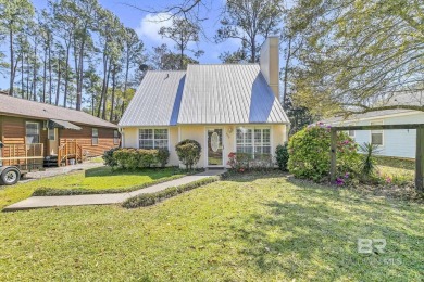 No HOA! This delightful 3-bedroom, 2-bath cottage is just 10 on Gulf State Park Golf Course in Alabama - for sale on GolfHomes.com, golf home, golf lot
