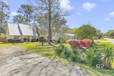 No HOA! This delightful 3-bedroom, 2-bath cottage is just 10 on Gulf State Park Golf Course in Alabama - for sale on GolfHomes.com, golf home, golf lot