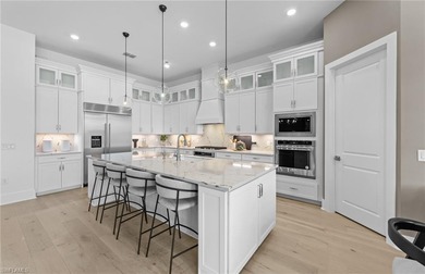 Fall in love with the stunning Layton Grande home in Terreno by on Valencia Golf and Country Club in Florida - for sale on GolfHomes.com, golf home, golf lot