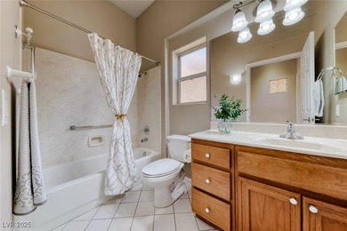 Charming single story home in the vibrant Sun City Summerlin 55+ on Eagle Crest Golf Club in Nevada - for sale on GolfHomes.com, golf home, golf lot