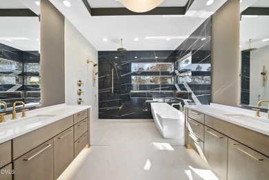 Stunning luxury home and pool house on NRCC 9th Fairway of the on North Ridge Country Club in North Carolina - for sale on GolfHomes.com, golf home, golf lot