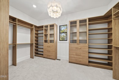 Stunning luxury home and pool house on NRCC 9th Fairway of the on North Ridge Country Club in North Carolina - for sale on GolfHomes.com, golf home, golf lot