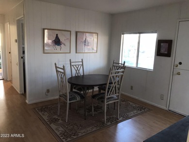 Enjoy stunning views from this beautifully maintained home on Queen Valley Golf Course in Arizona - for sale on GolfHomes.com, golf home, golf lot