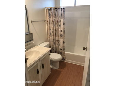 Enjoy stunning views from this beautifully maintained home on Queen Valley Golf Course in Arizona - for sale on GolfHomes.com, golf home, golf lot