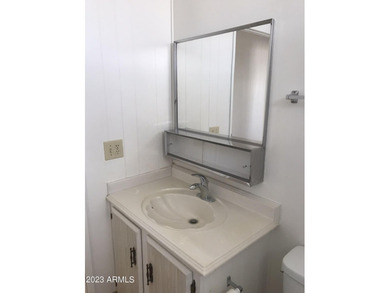 Enjoy stunning views from this beautifully maintained home on Queen Valley Golf Course in Arizona - for sale on GolfHomes.com, golf home, golf lot