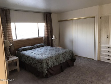 Enjoy stunning views from this beautifully maintained home on Queen Valley Golf Course in Arizona - for sale on GolfHomes.com, golf home, golf lot