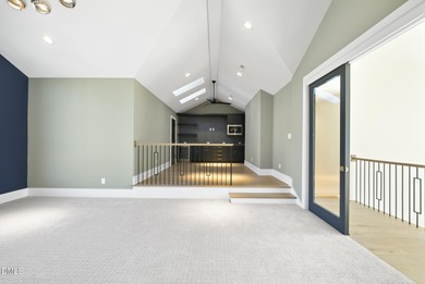 Stunning luxury home and pool house on NRCC 9th Fairway of the on North Ridge Country Club in North Carolina - for sale on GolfHomes.com, golf home, golf lot