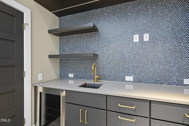 Stunning luxury home and pool house on NRCC 9th Fairway of the on North Ridge Country Club in North Carolina - for sale on GolfHomes.com, golf home, golf lot