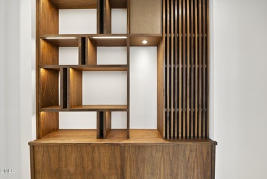 Stunning luxury home and pool house on NRCC 9th Fairway of the on North Ridge Country Club in North Carolina - for sale on GolfHomes.com, golf home, golf lot