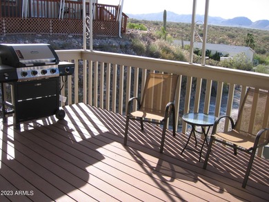 Enjoy stunning views from this beautifully maintained home on Queen Valley Golf Course in Arizona - for sale on GolfHomes.com, golf home, golf lot