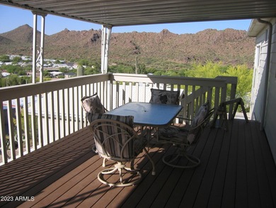 Enjoy stunning views from this beautifully maintained home on Queen Valley Golf Course in Arizona - for sale on GolfHomes.com, golf home, golf lot
