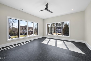 Stunning luxury home and pool house on NRCC 9th Fairway of the on North Ridge Country Club in North Carolina - for sale on GolfHomes.com, golf home, golf lot