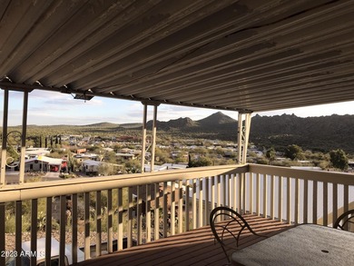 Enjoy stunning views from this beautifully maintained home on Queen Valley Golf Course in Arizona - for sale on GolfHomes.com, golf home, golf lot