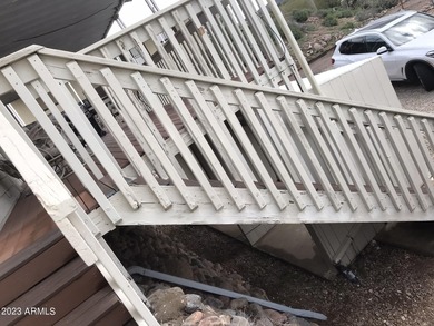 Enjoy stunning views from this beautifully maintained home on Queen Valley Golf Course in Arizona - for sale on GolfHomes.com, golf home, golf lot