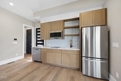 Stunning luxury home and pool house on NRCC 9th Fairway of the on North Ridge Country Club in North Carolina - for sale on GolfHomes.com, golf home, golf lot