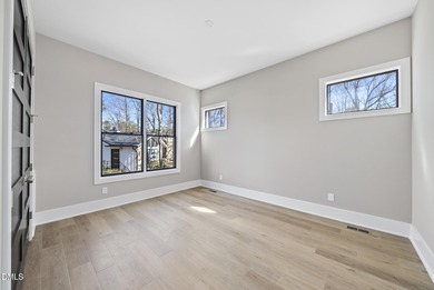 Stunning luxury home and pool house on NRCC 9th Fairway of the on North Ridge Country Club in North Carolina - for sale on GolfHomes.com, golf home, golf lot